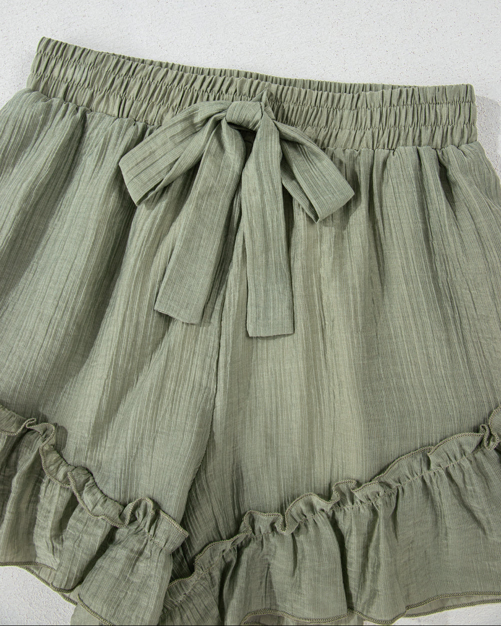 Dahlia Textured Tie Waist Ruffle Hem Shorts in L view 3 (bottom)
