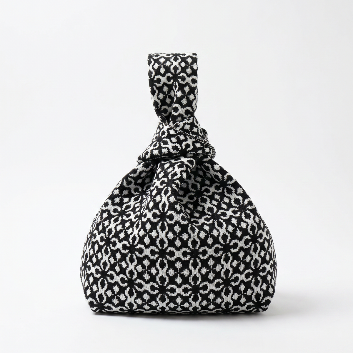 The Black Solitaire Handbag in Medium