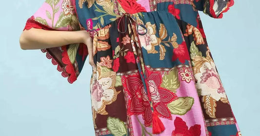 women's fashion 2026 flirty skirts for curvy women featuring Umgee Abstract Print V-neck mini dress from MeeeShop USA boutique.