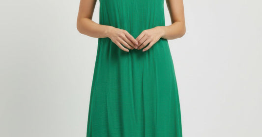 women's spring outfit ideas 2026 women wearing a solid sleeveless dress from Mlle Gabrielle