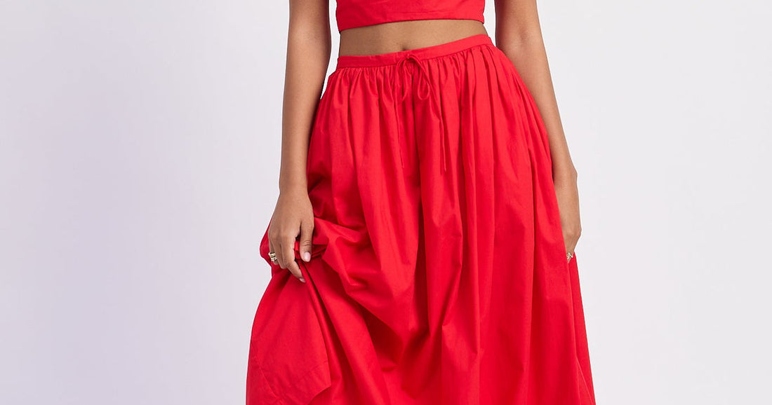 Affordable boutique fashion USA women wearing a Poppy midi skirt from Meeeshop