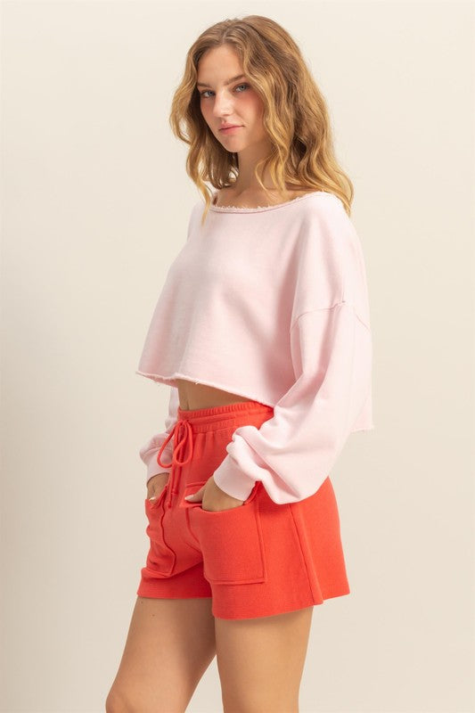 HYFVE Frayed Detail Boat Neck Long Sleeve Crop Top in Soft Pink - us.meeeshop