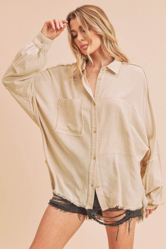 Aemi + Co Raw Edge Exposed Seam Collared Neck Long Sleeve Shirt in Oatmeal - us.meeeshop