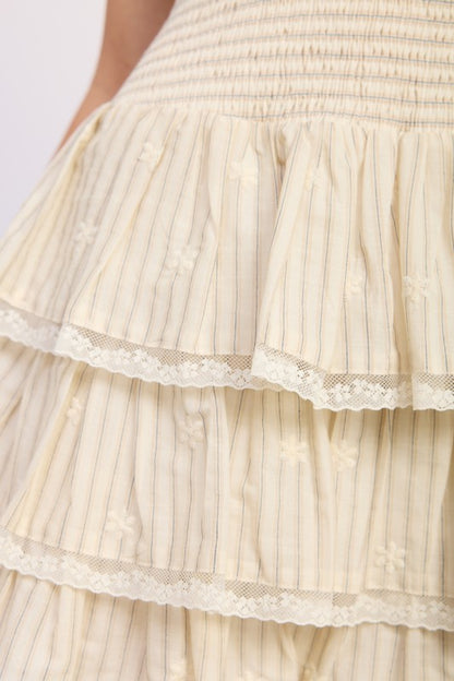 Sleeveless Tiered Mini Dress with Smocking | view 2 | Emory Park | us.meeeshop