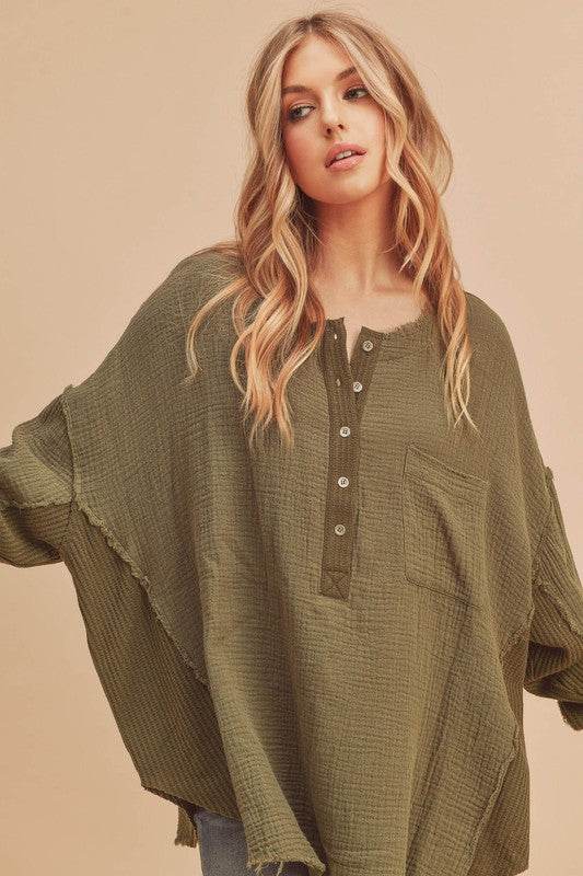 Aemi + Co Exposed Seam Raw Hem Half Button Top in Olive - us.meeeshop