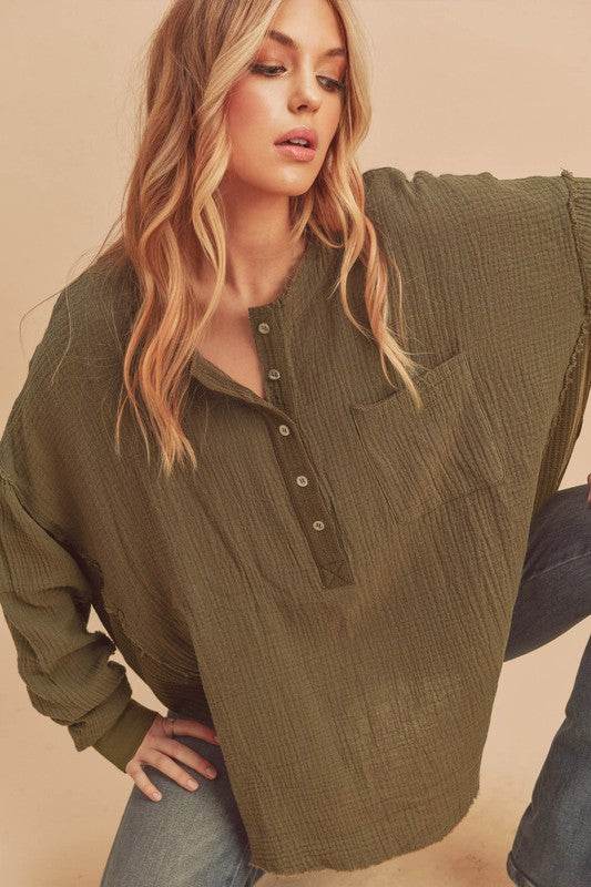 Aemi + Co Exposed Seam Raw Hem Half Button Top in Olive - us.meeeshop