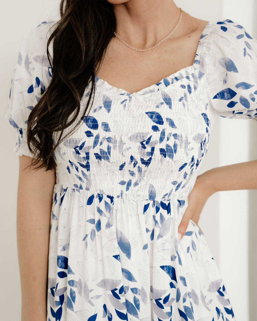faith smocked bodice Faith Smocked Bodice Short Puff Sleeve Tiered Floral Midi Dress view 7 (dress) - shop at us.meeeshop