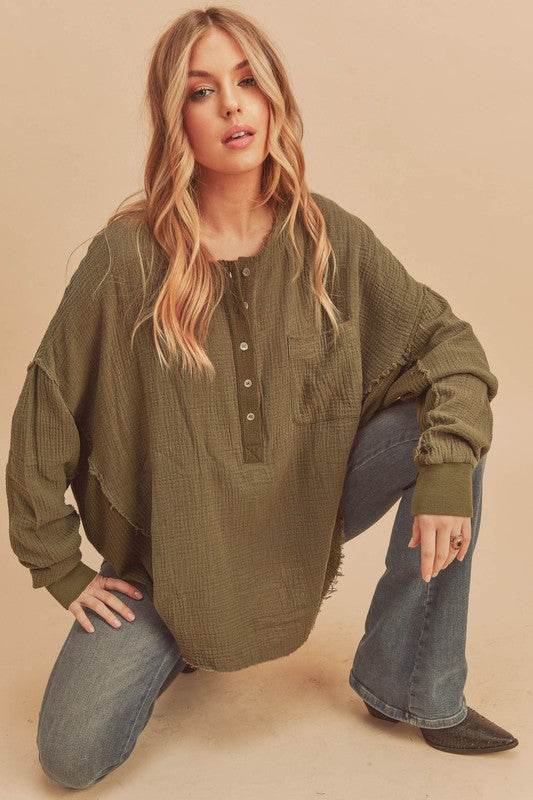 Aemi + Co Exposed Seam Raw Hem Half Button Top in Olive - us.meeeshop