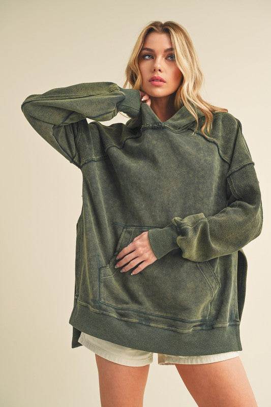 Aemi + Co Exposed Seam Side Slit Hoodie with Kangaroo Pocket in Army Green - us.meeeshop