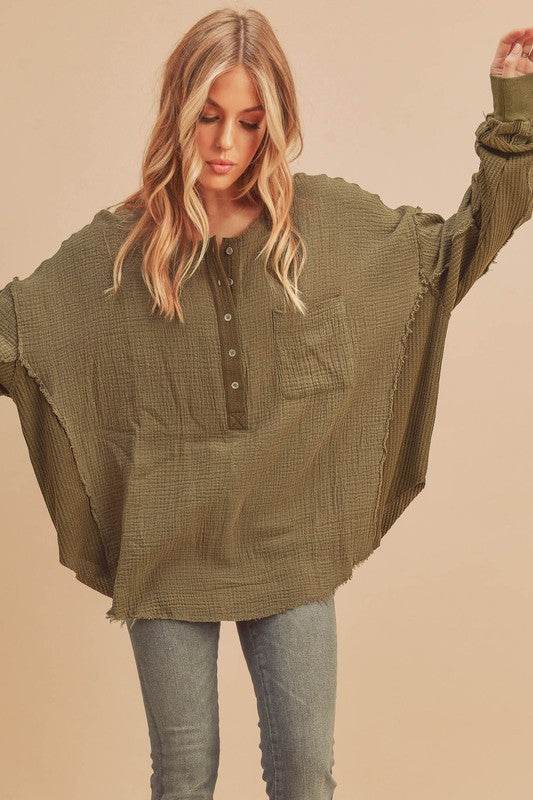 Aemi + Co Exposed Seam Raw Hem Half Button Top in Olive - us.meeeshop