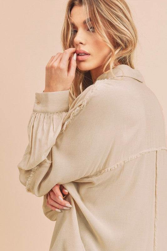 Aemi + Co Raw Edge Exposed Seam Collared Neck Long Sleeve Shirt in Oatmeal - us.meeeshop