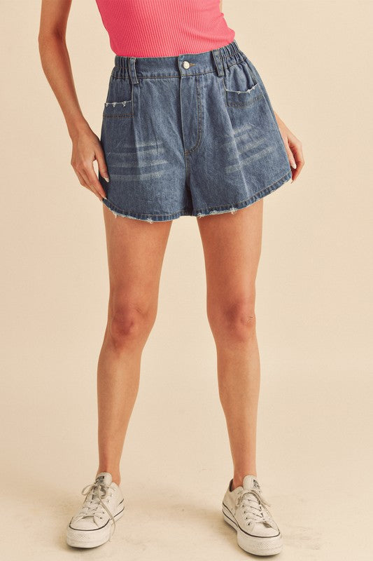 Aemi + Co Frayed Hem Elastic Waist Denim Shorts in Medium - us.meeeshop