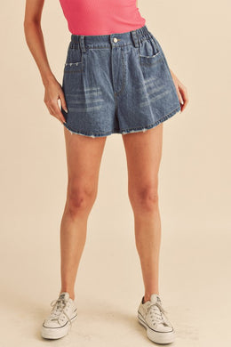 Aemi + Co Frayed Hem Elastic Waist Denim Shorts in Medium