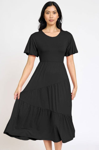 Plus Solid Diagonal Tiered Flowy Dress us.meeeshop - 