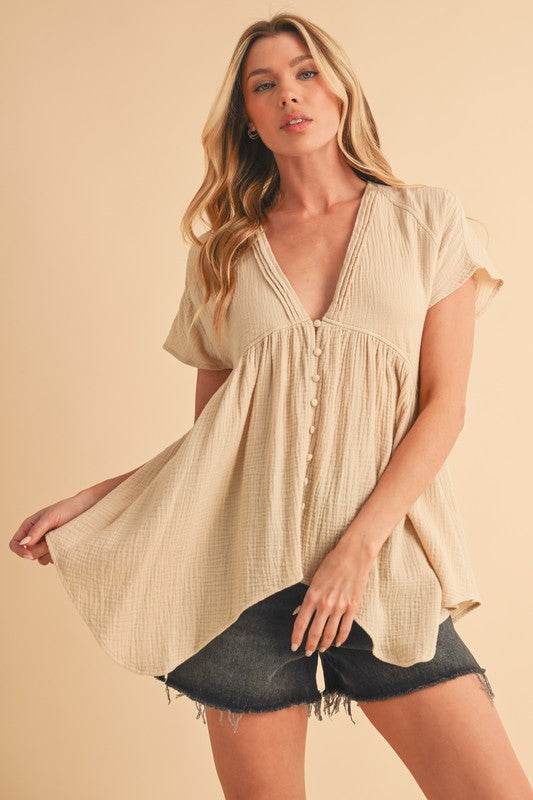 Aemi + Co Tuck Detail V-Neck Short Sleeve Blouse in Oatmeal - us.meeeshop