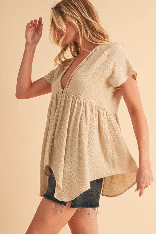 Aemi + Co Tuck Detail V-Neck Short Sleeve Blouse in Oatmeal - us.meeeshop