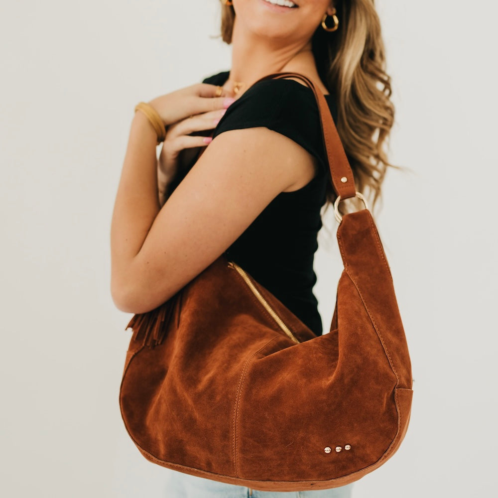 Hazel Hobo Shoulder Bag with Tassel in Tan Suede view 2 - Hazel Hobo Bag Charles And Keith