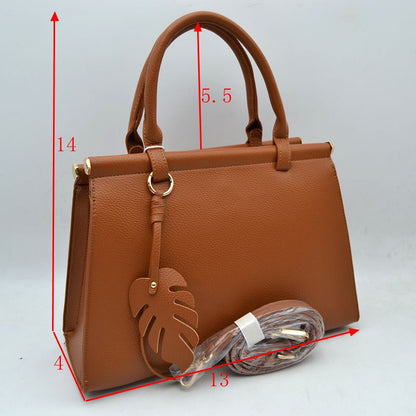 Madeline Love Elegant Tote Handbag with Detachable Shoulder Strap & Round Charm Keychain in Brown view 2 - Roun Tote