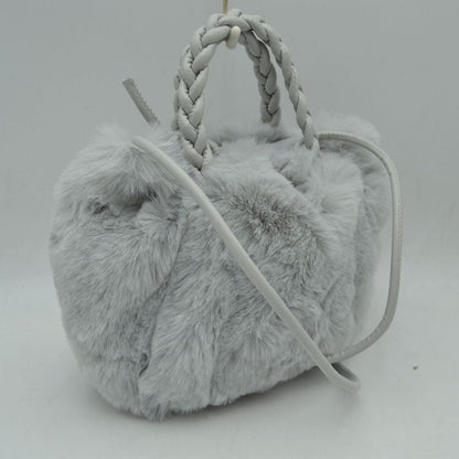 Madeline Love Plush Faux Fur Bucket Handbag with Braided Handles and Long Strap view 13 - Strap Handbag