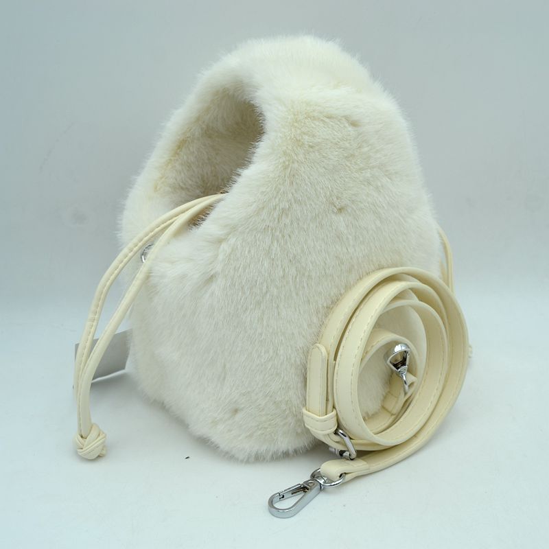 Madeline Love Plush Faux Fur Bucket Handbag with Drawstring and Removable Strap view 16 - Remova Handbag