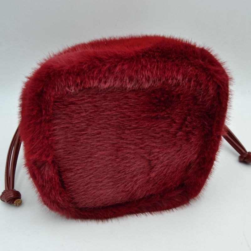 Madeline Love Plush Faux Fur Bucket Handbag with Drawstring and Removable Strap view 18 - Remova Handbag