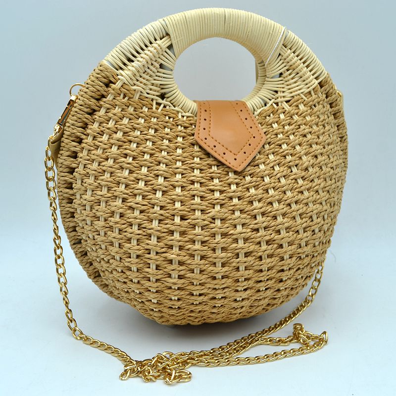 Madeline Love Round Woven Straw Handbag with Rattan Cutout Handle in Green - Handle Handbag
