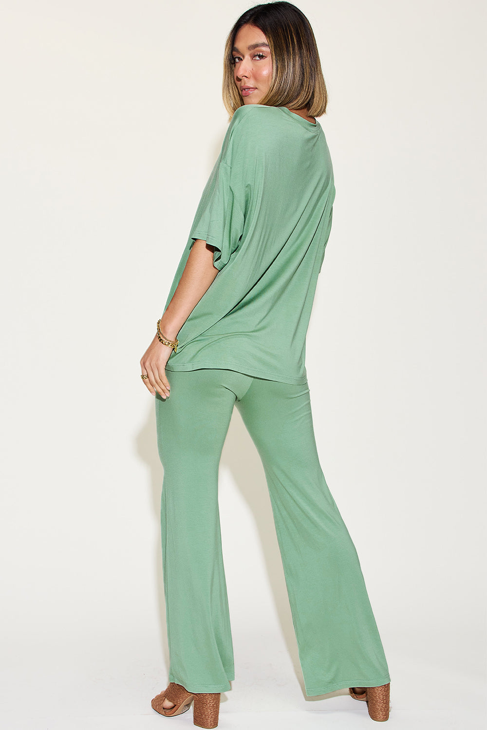 Shopbasicbae Basic Bae Full Size Bamboo Drop Shoulder T-shirt and Flare Pants Set in Black view 6 - Basic Bae Lounge Set