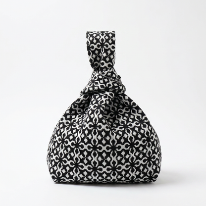 The Black Solitaire Handbag in Medium